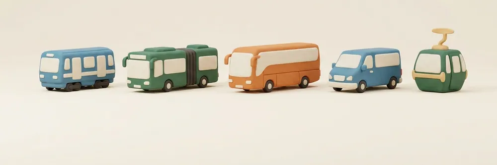 Clay models of a metro car, buses and a gondola